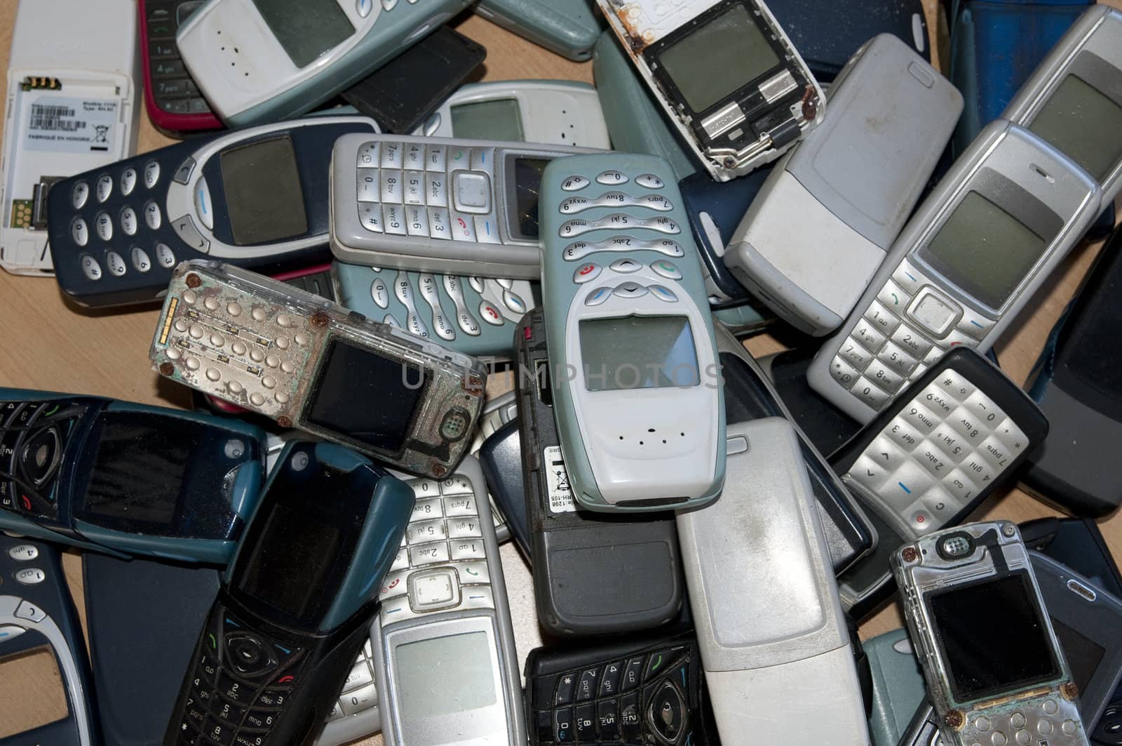 Lots of old and very used mobile phones