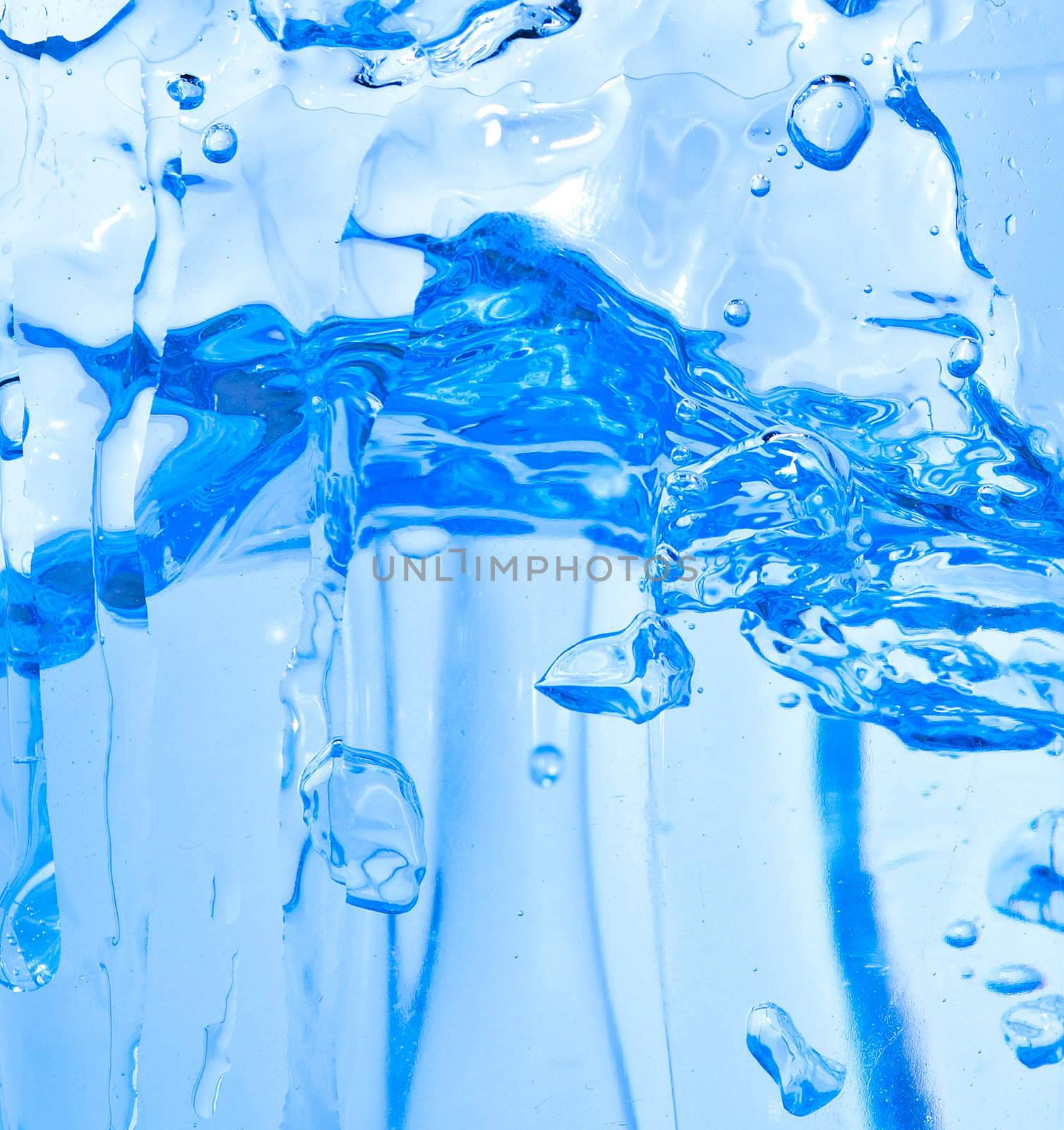 Sparks of blue water on a white background