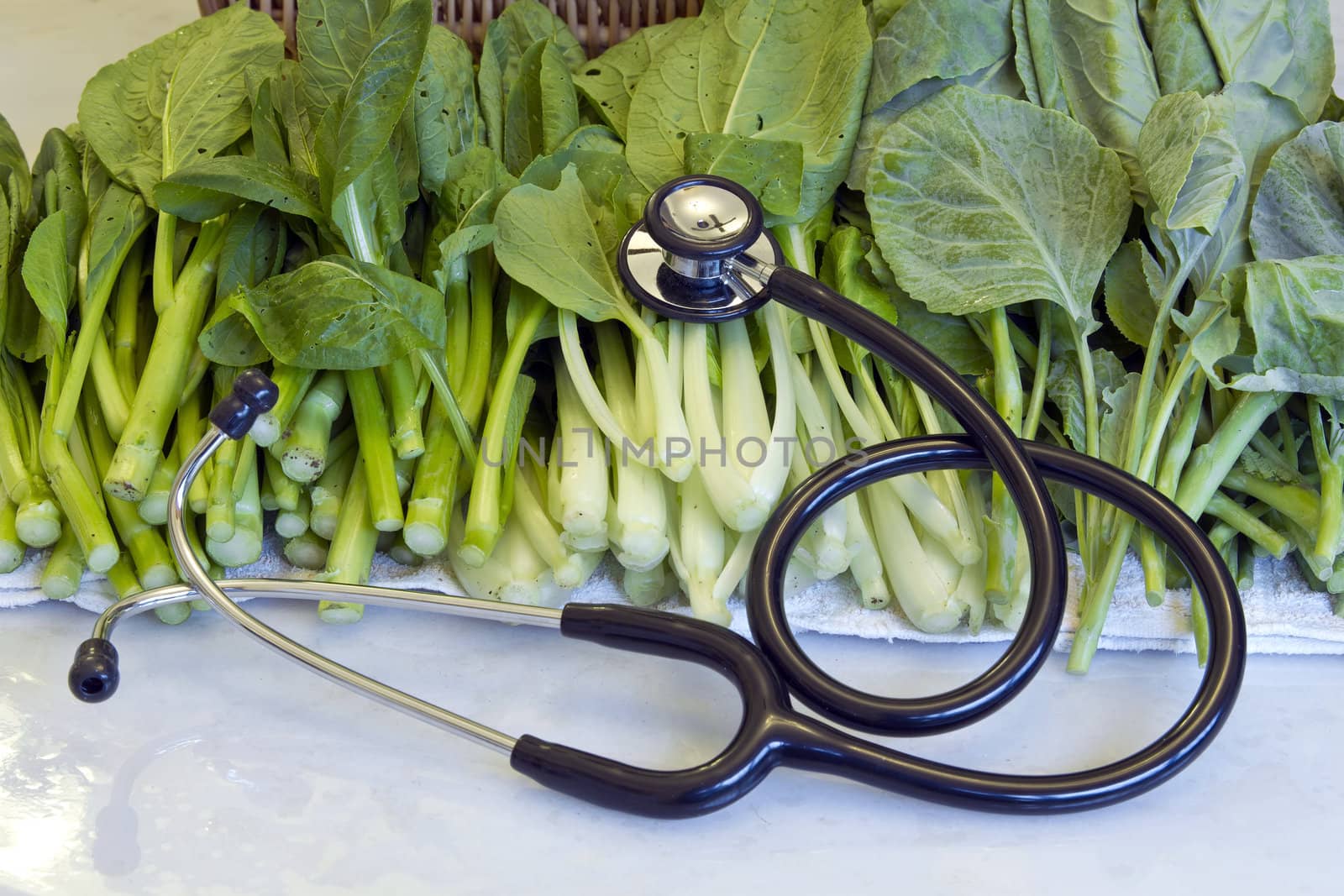 Doctor Stethoscope and Healthy Organic Green Vegetable