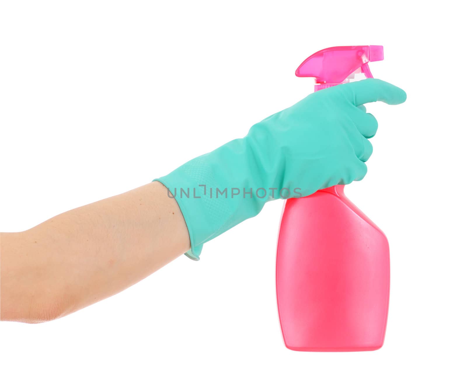 The hand in a green glove holds a pink bottle