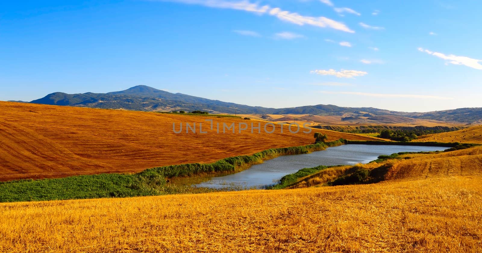 Tuscany Landscape With Pond In The Morning
