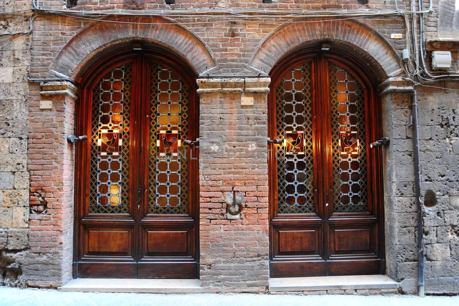 Close-up Image Of Two Glass Ancient Italian Door