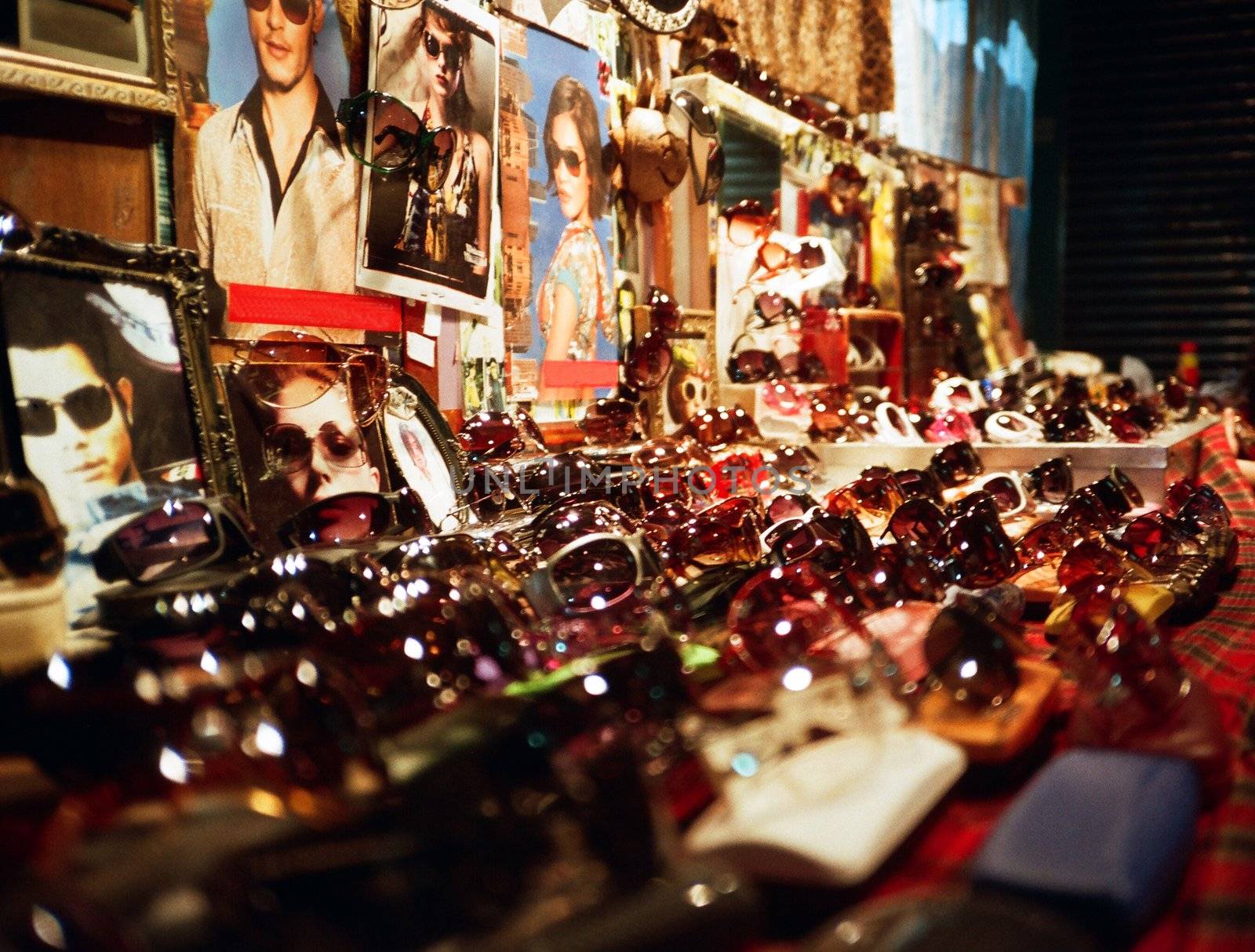 Many brands of sun-glasses can be found in night market, HongKong.