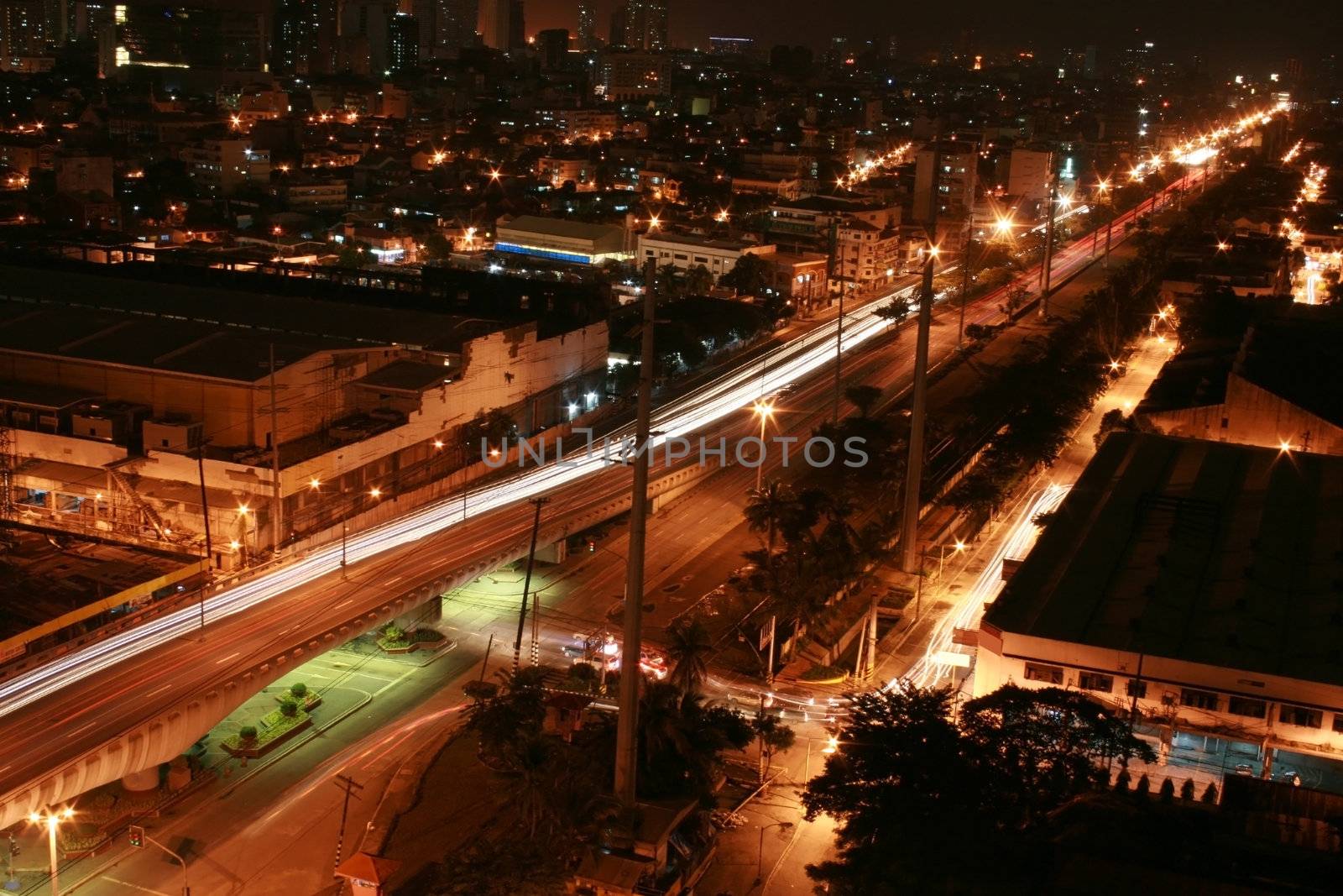 cityscape at night with lights and motion blur
