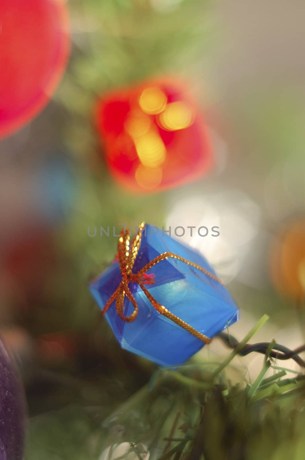 blue gift on a Christmas decoration