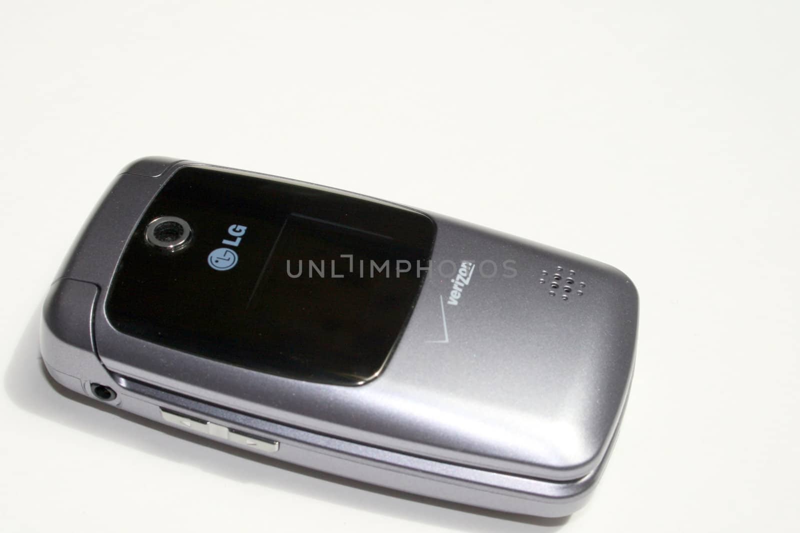 a new LG brand cell phone, in a silver case