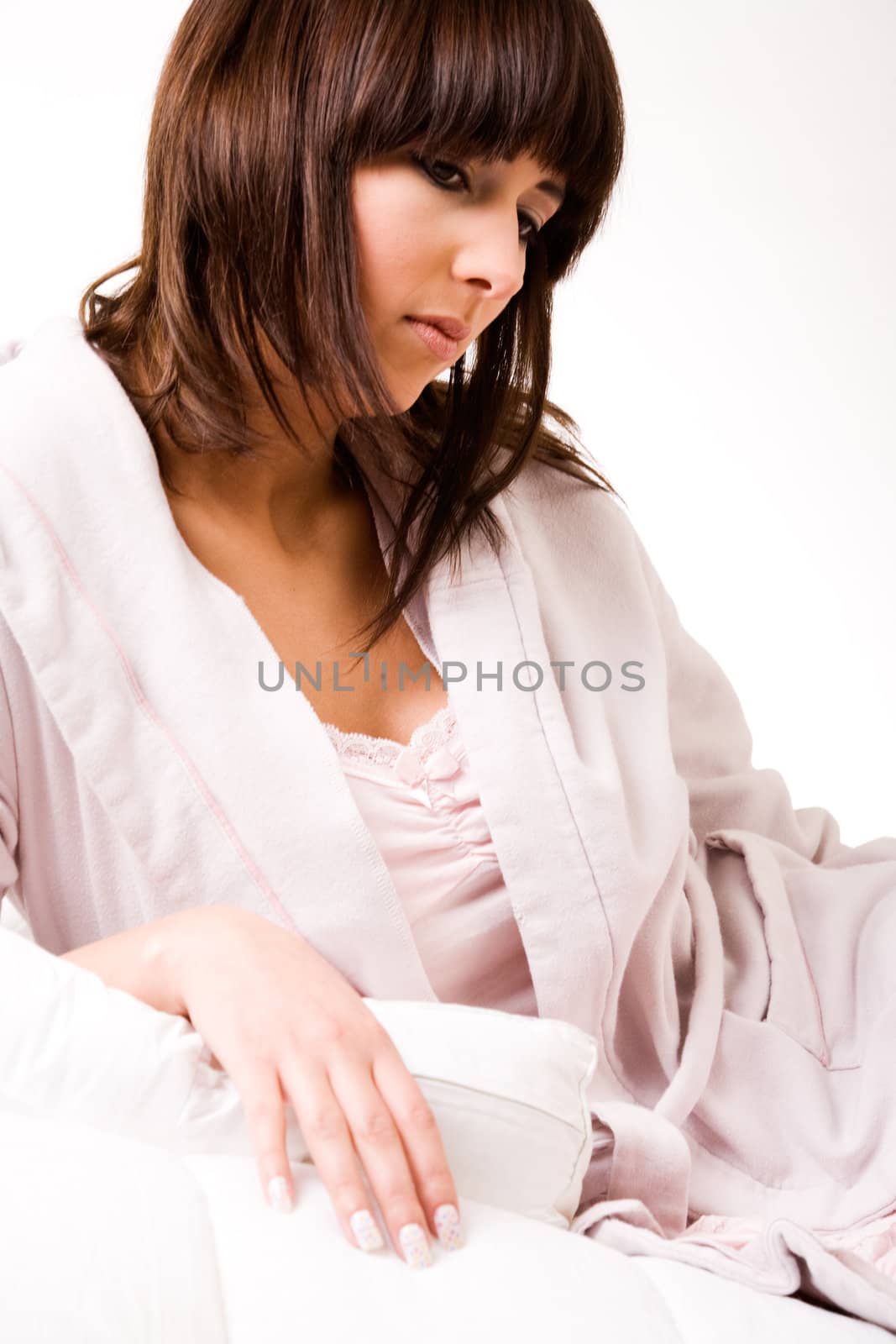 Brunette in bathrobe waking up