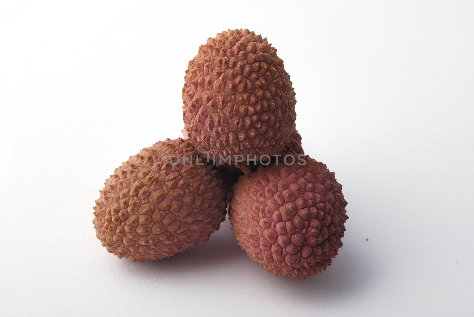 litchis on a white background