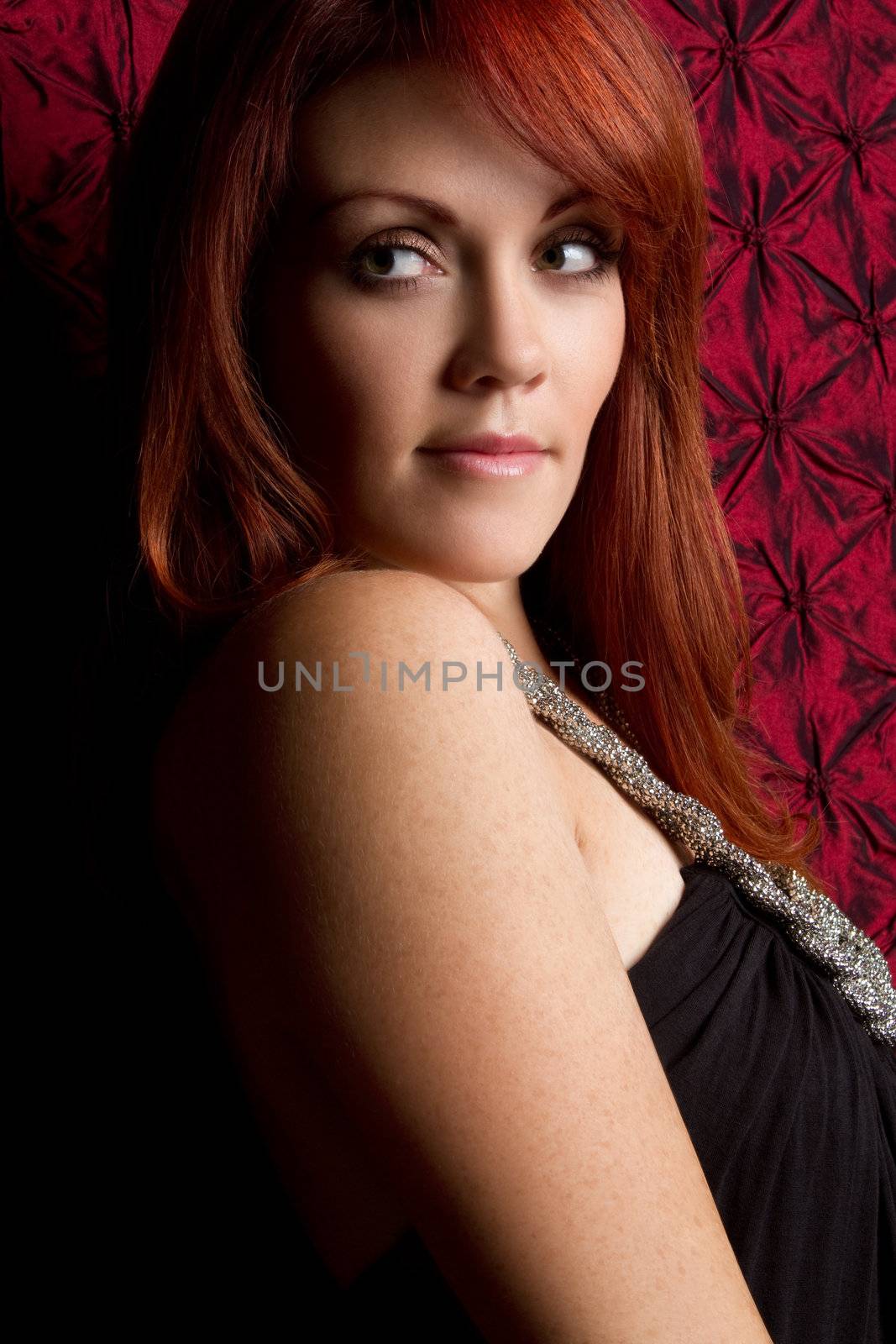 Beautiful young redhead woman smiling