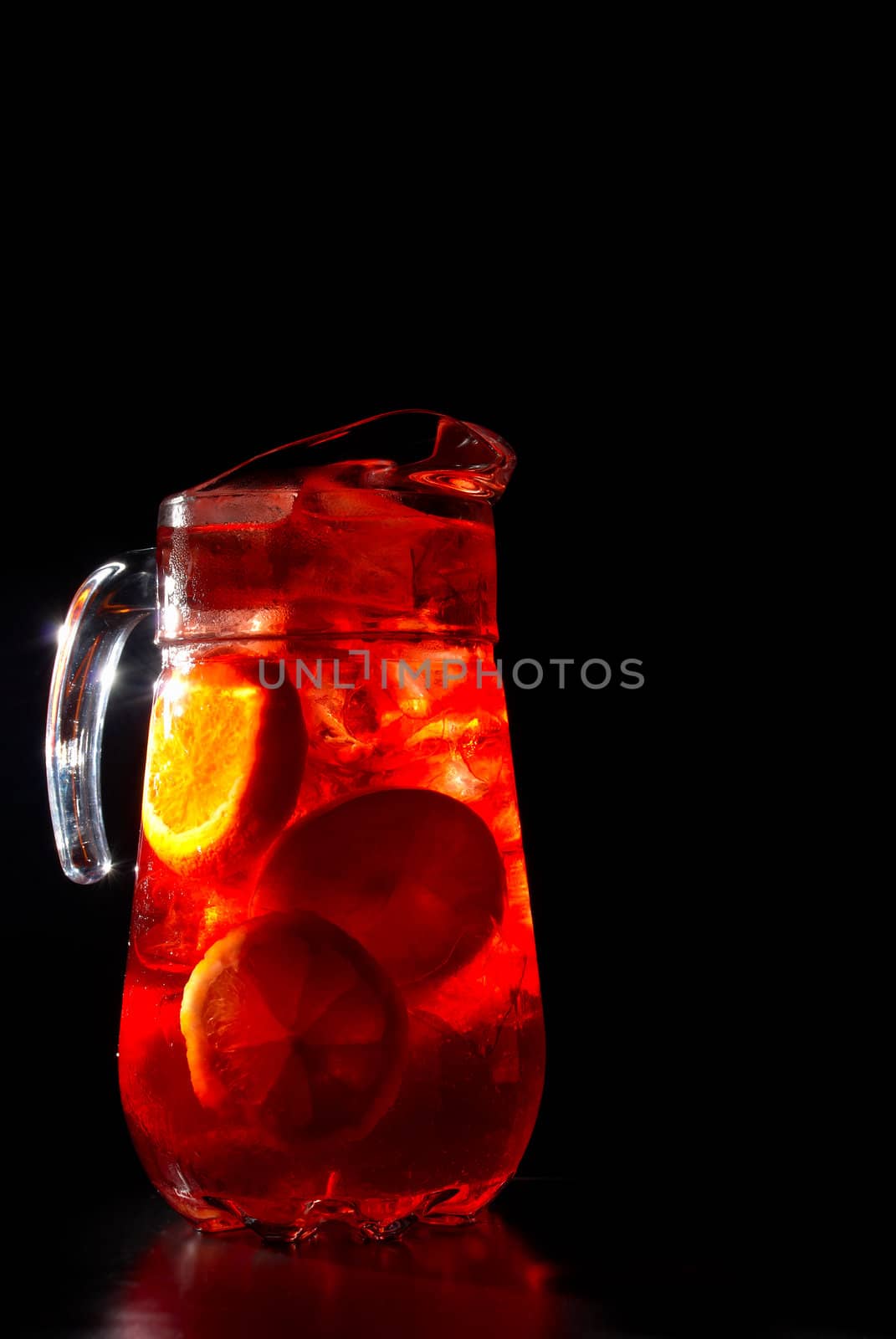 Jug of chilled Spanish sangria with fresh fruit