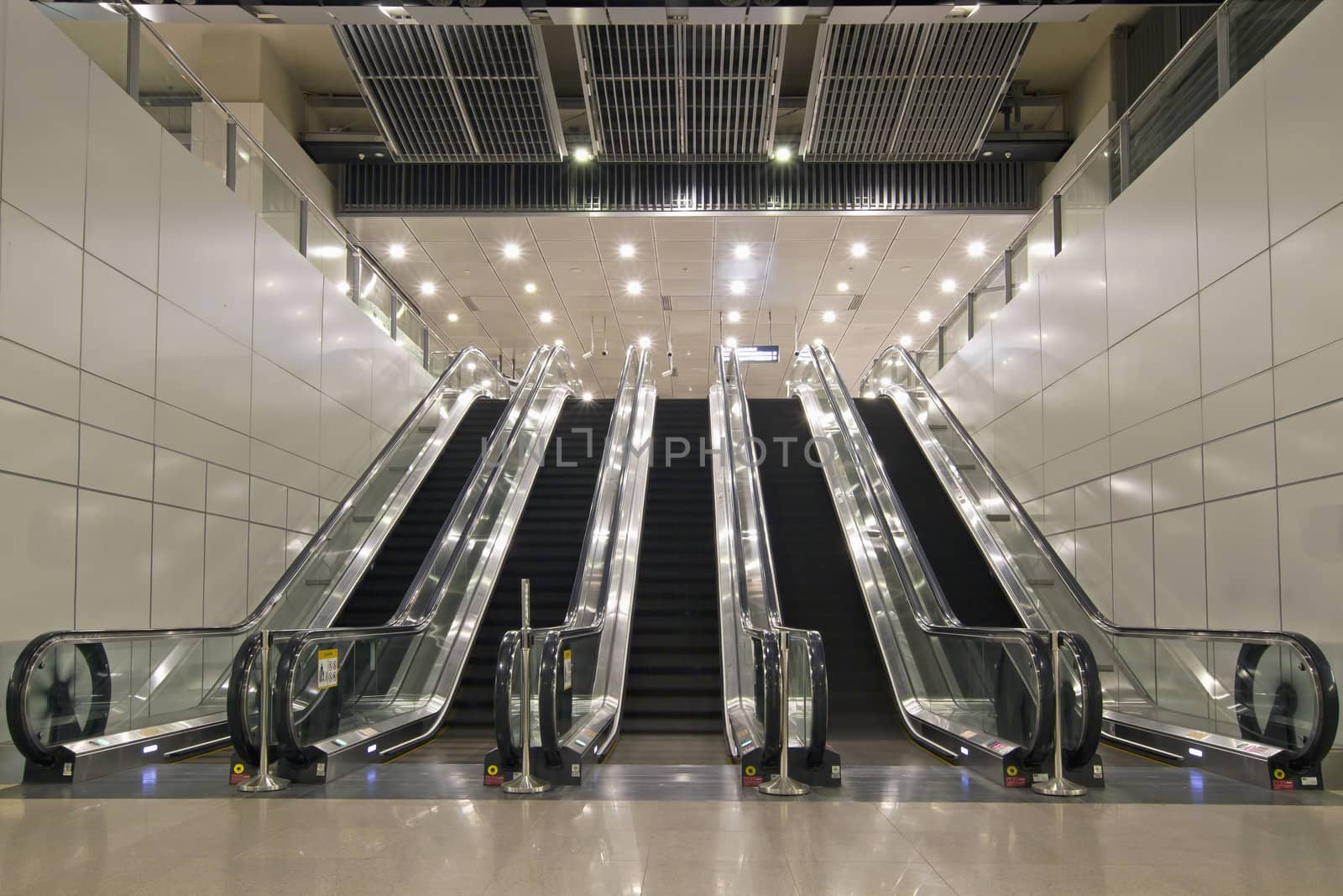 Escalators in Underground Tunnel of Train Station