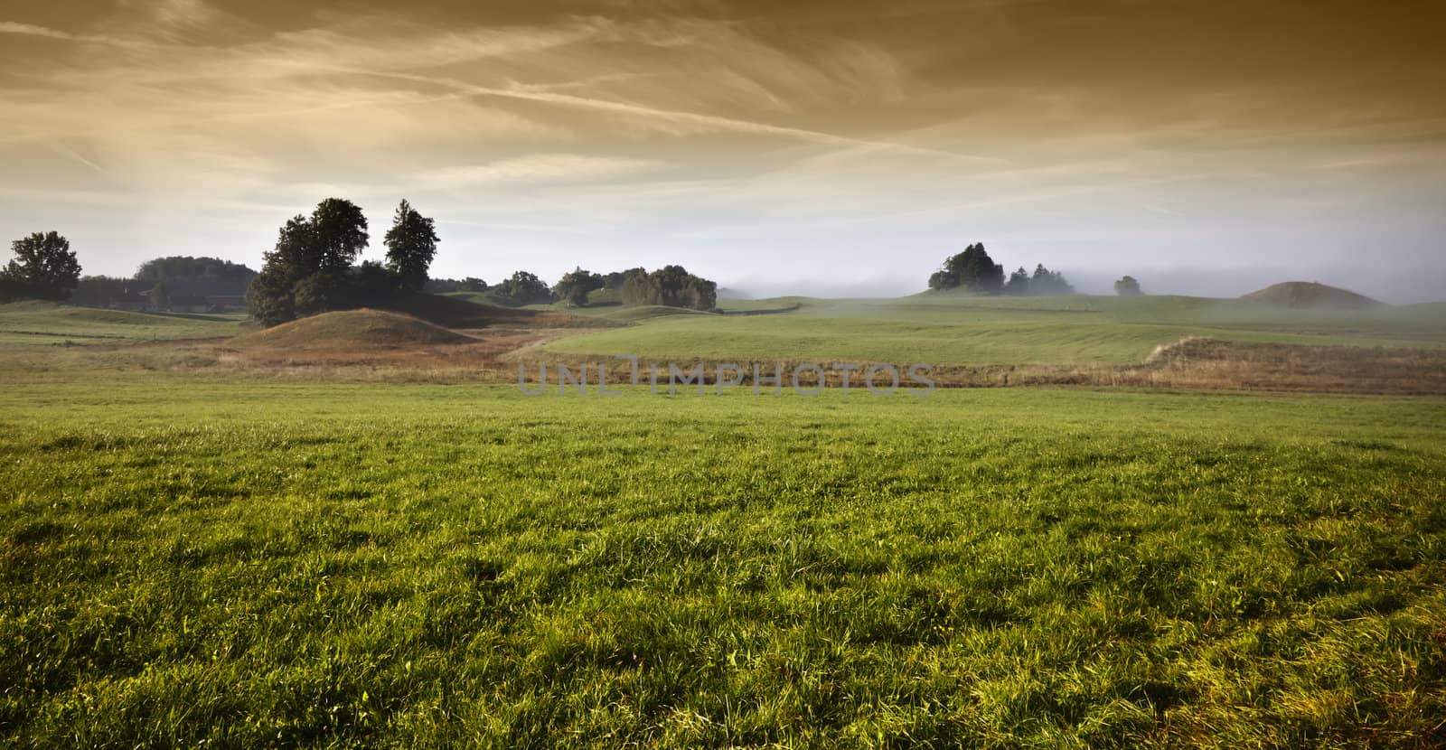 An image of a beautiful landscape with fog in bavaria germany