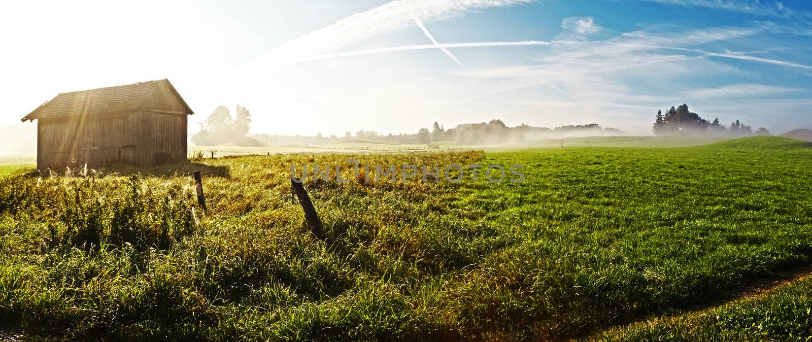 An image of a beautiful landscape with fog in bavaria germany