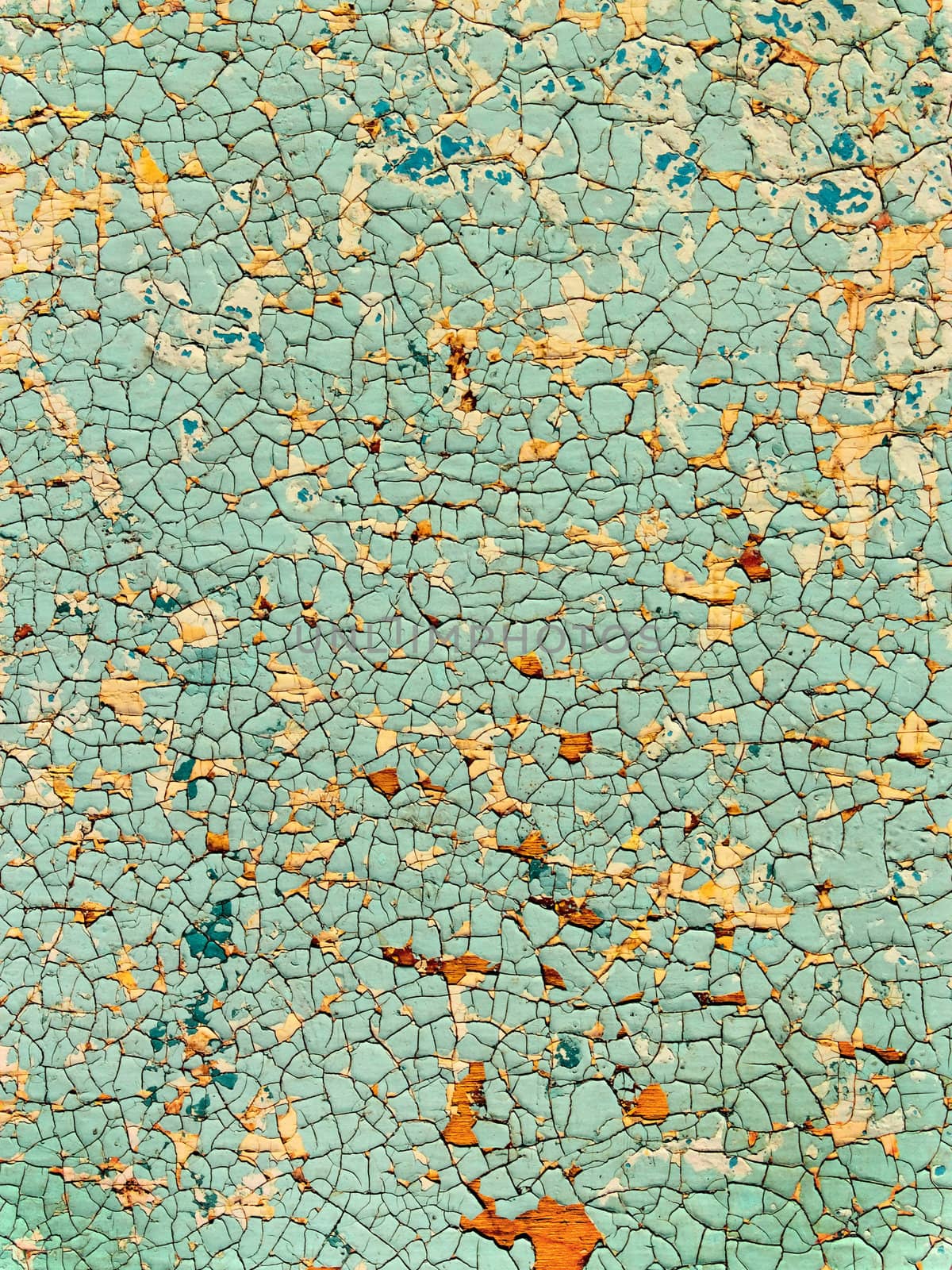 The old cracked painted surface. Colorful texture