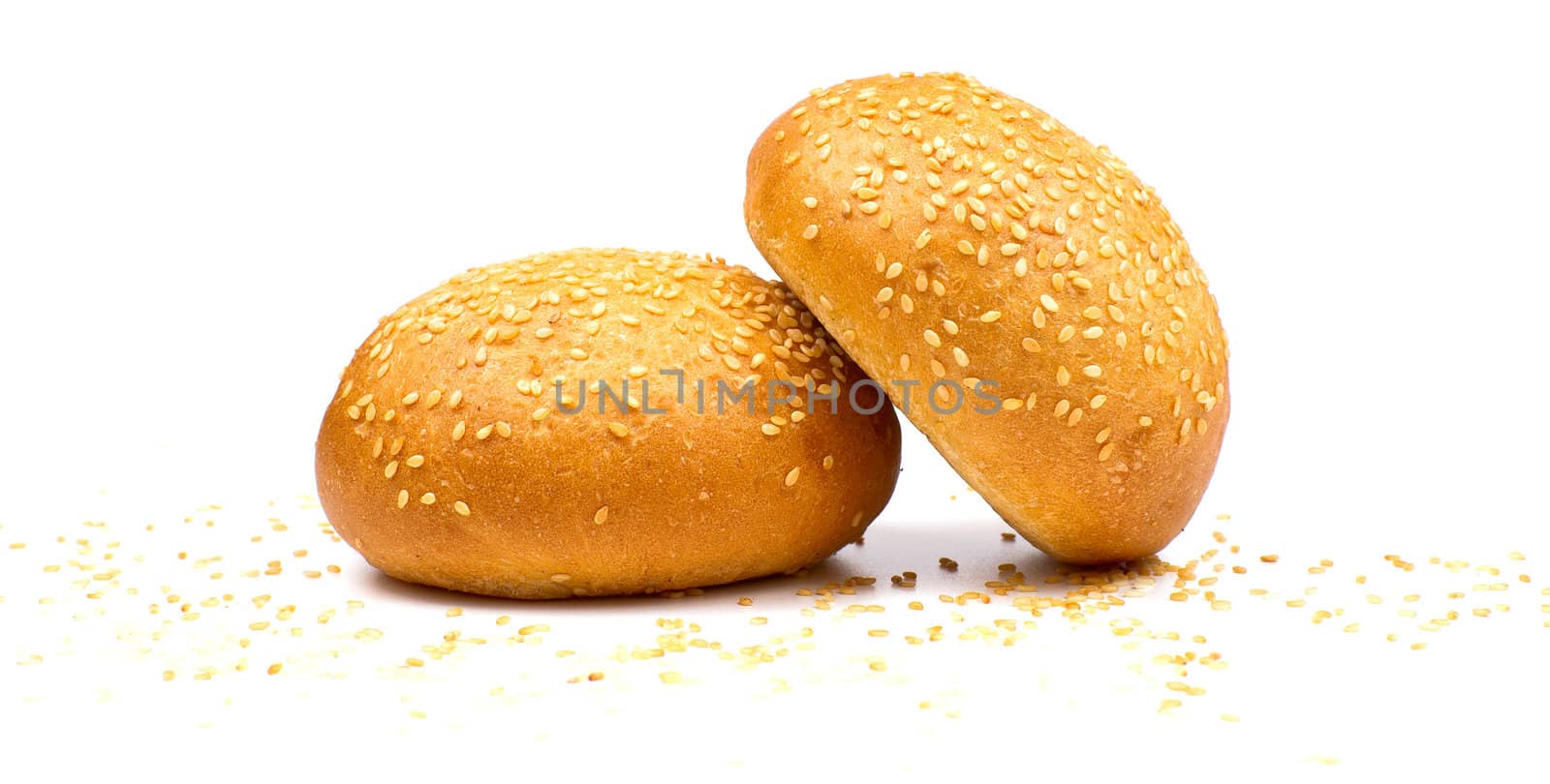 Two buns with sesame isolated on the white background