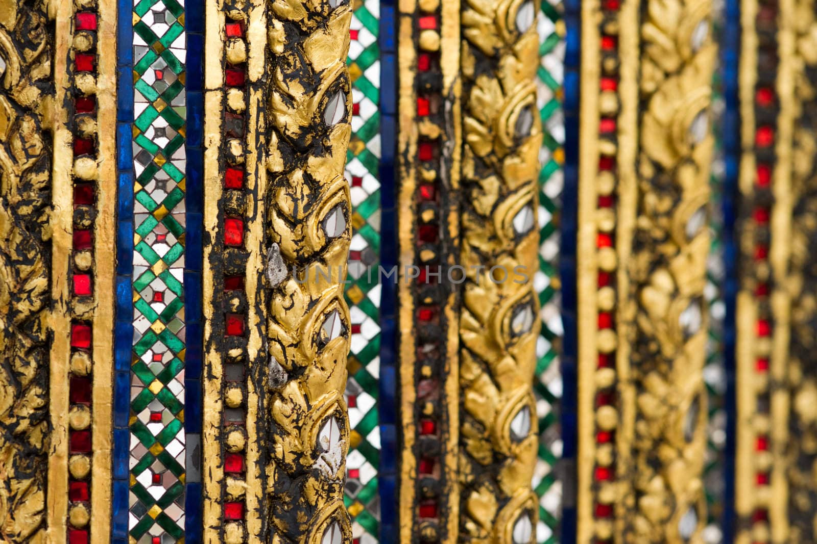 Pattern of mirror mosaic on the wall in Grand palace, Bangkok, Thailand