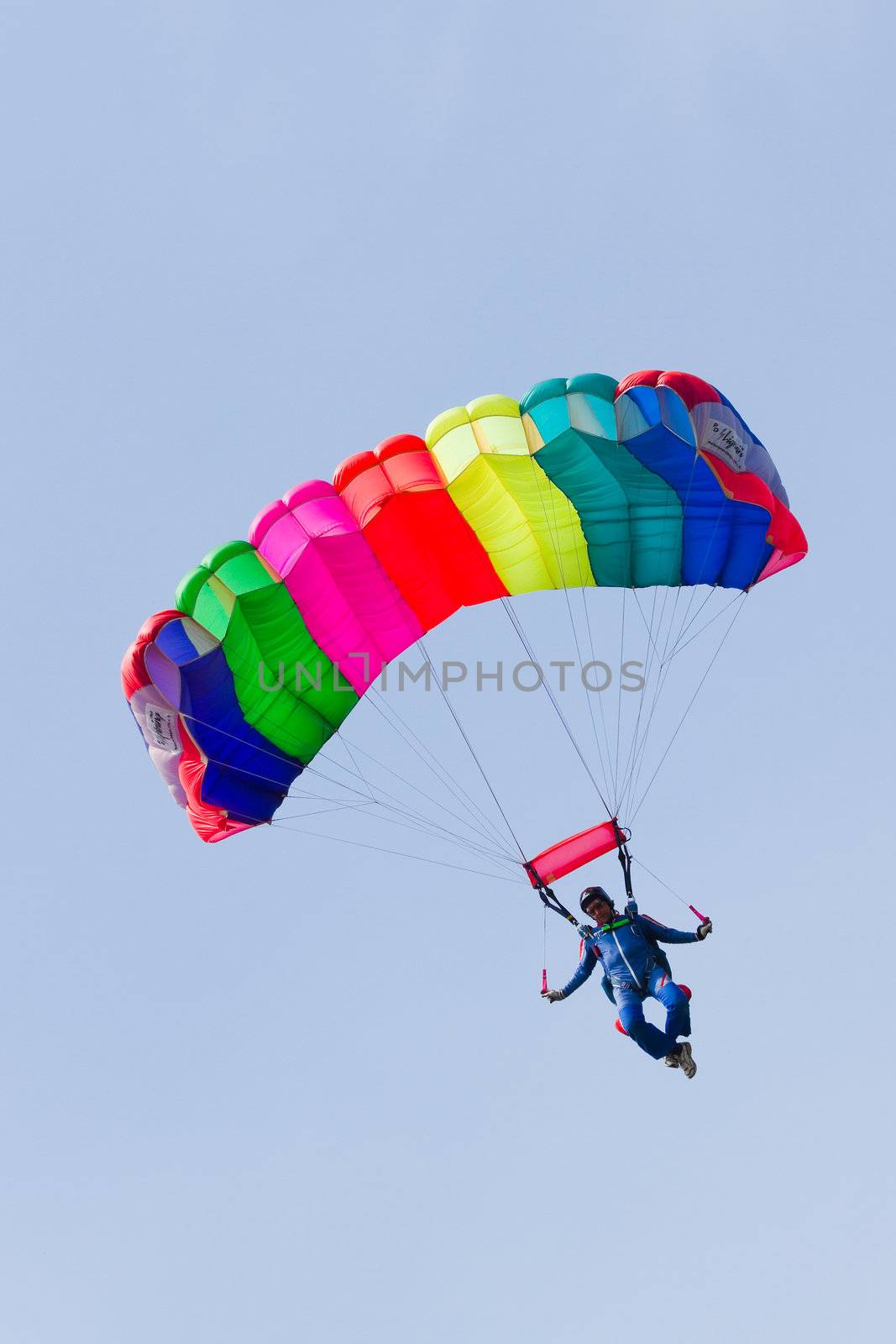 Parachutist demonstrate jumping from airplane by Colette