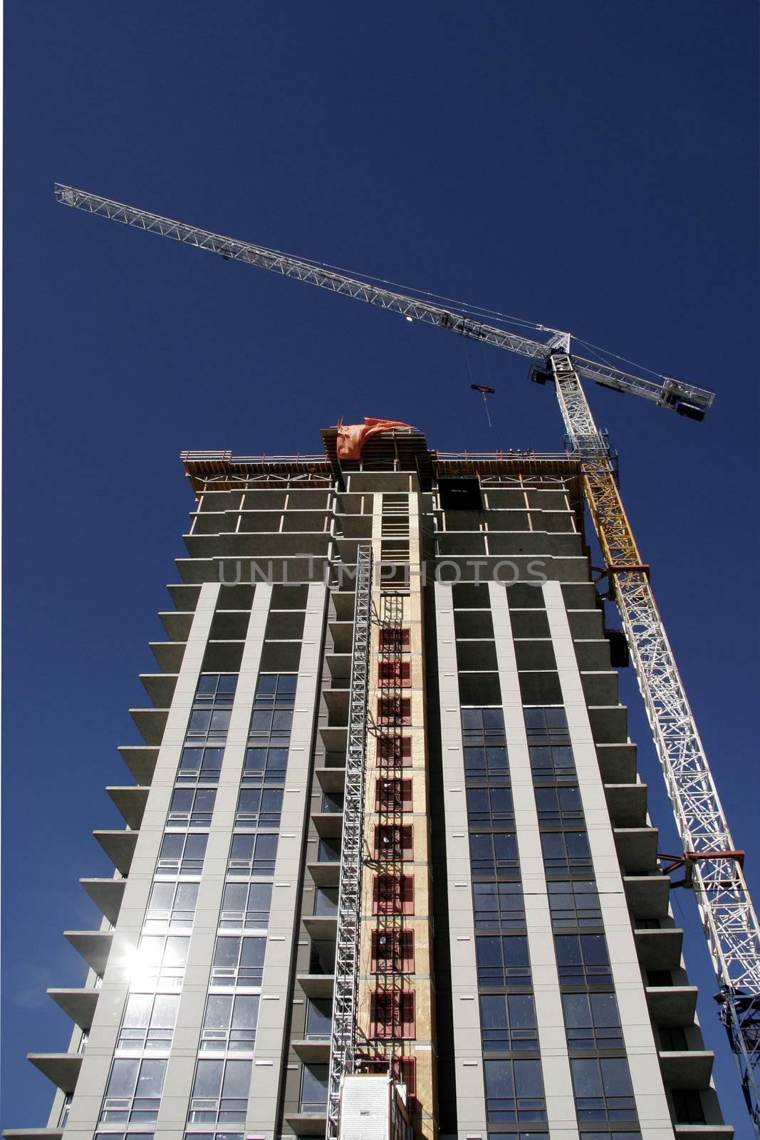 High rise building with crane