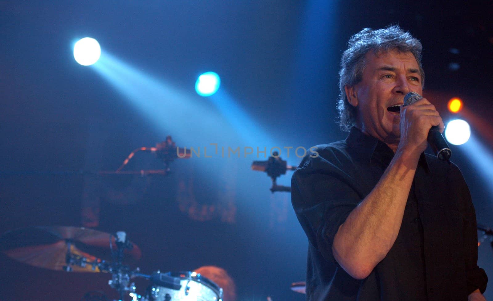 BRNO, CZECH REP., FEBRUARY-22:   Ian Gillan, singer of British band Deep Purple in performance at the hall Rondo February 22, 2006 in Brno, Czech Republic. The group arrived as part of tour for the new album Rapture Of The Deep. by haak78