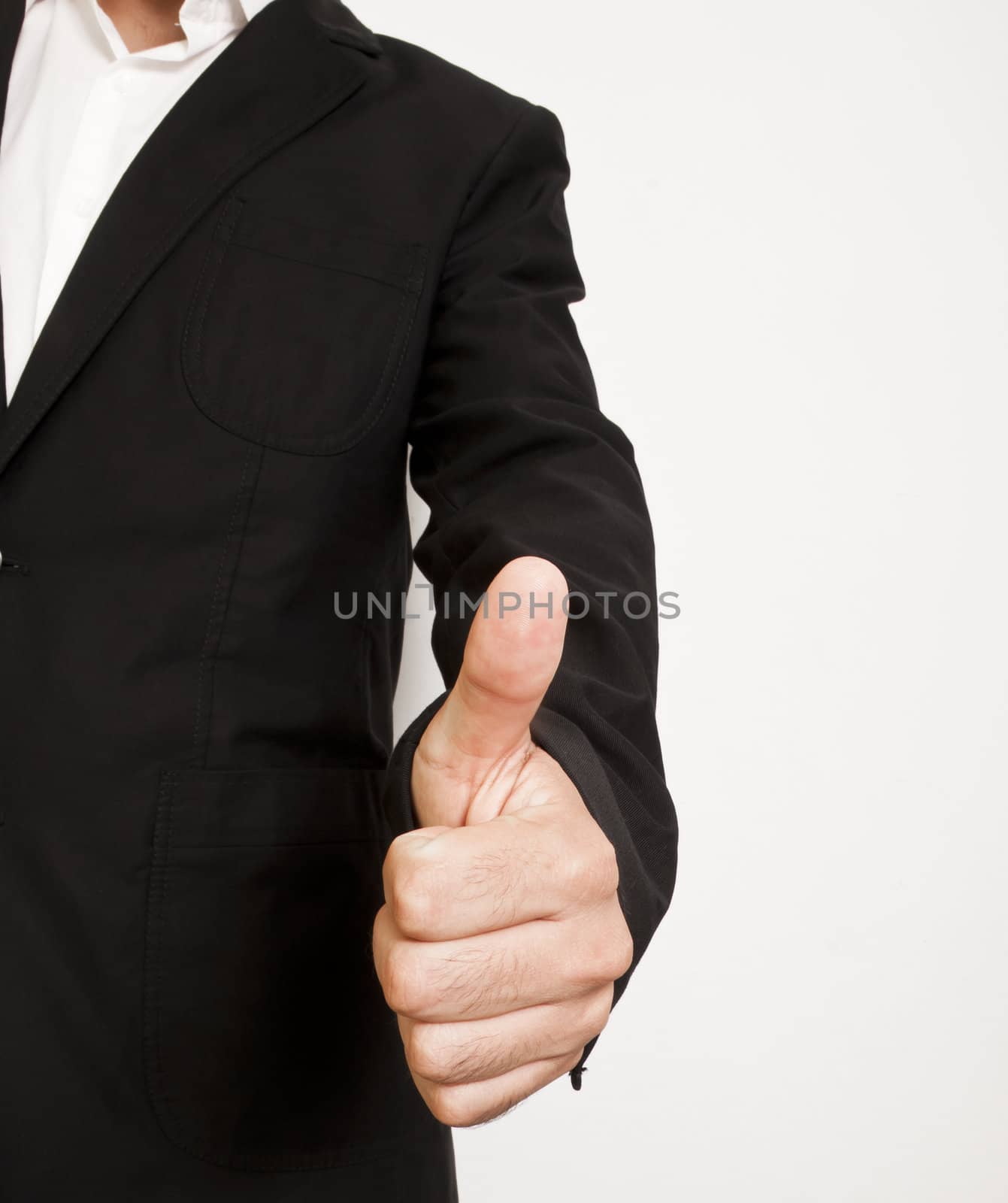 man dressed in elegant confirmation with your hand ok by peus
