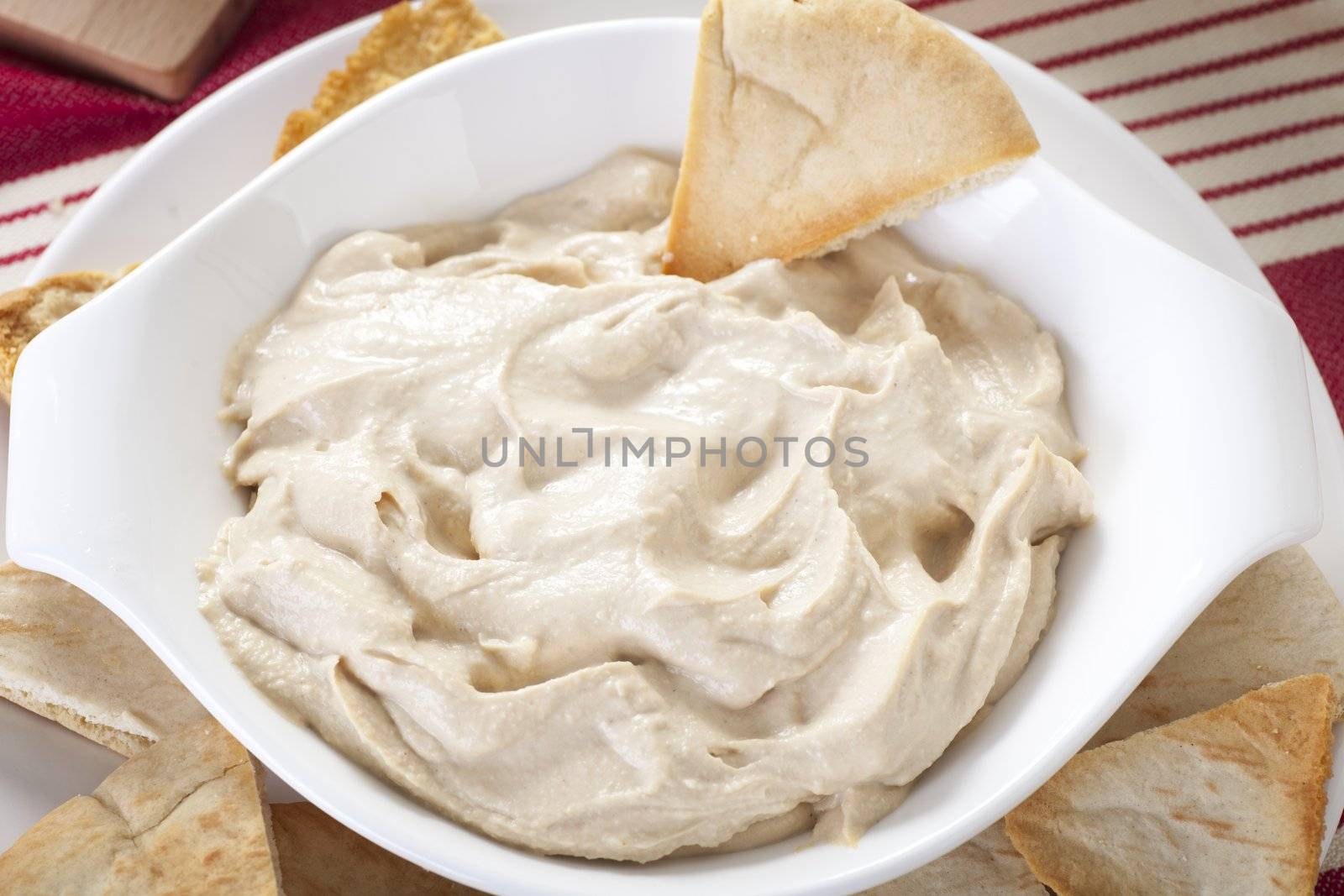 Hummus plate with pita bread.