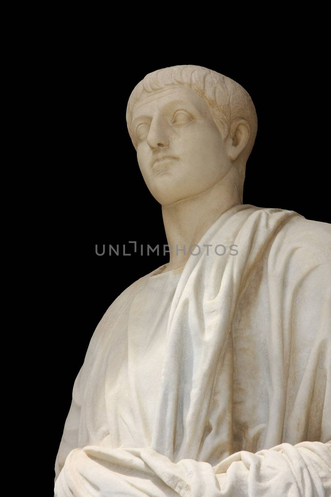 Roman statue on black background