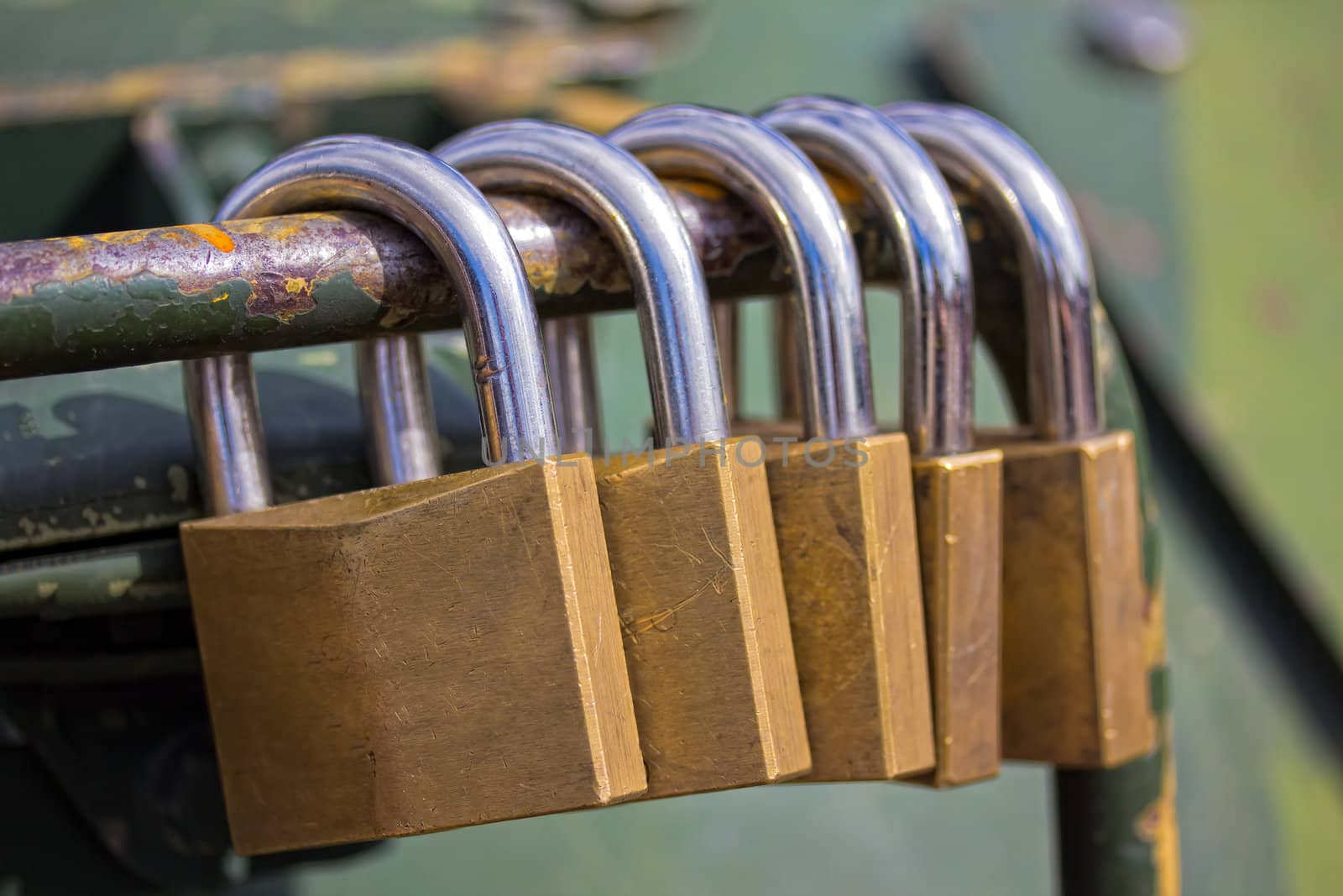 Photograph of several security locks found on a military tank