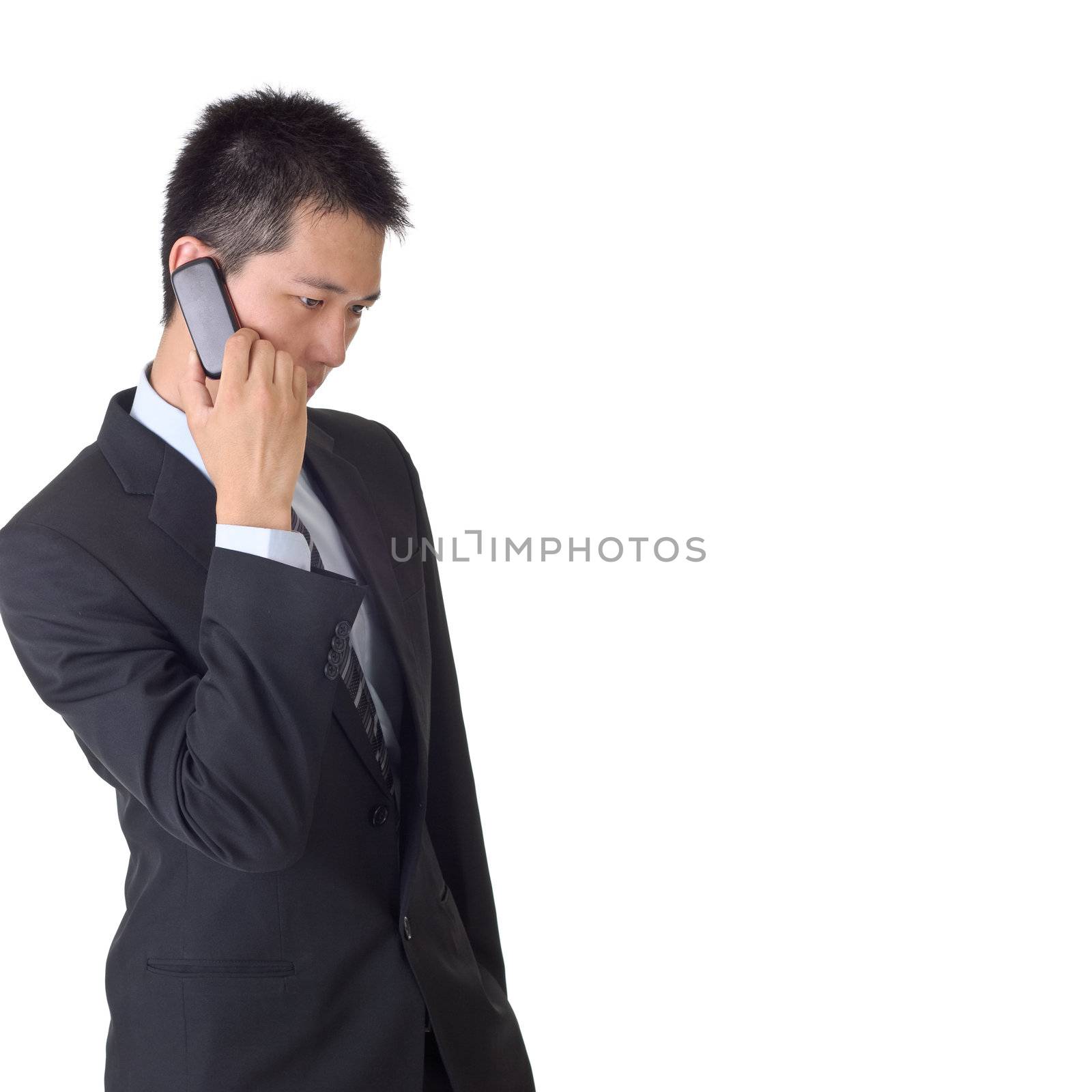 Business man on phone, closeup portrait with copyspace on white.