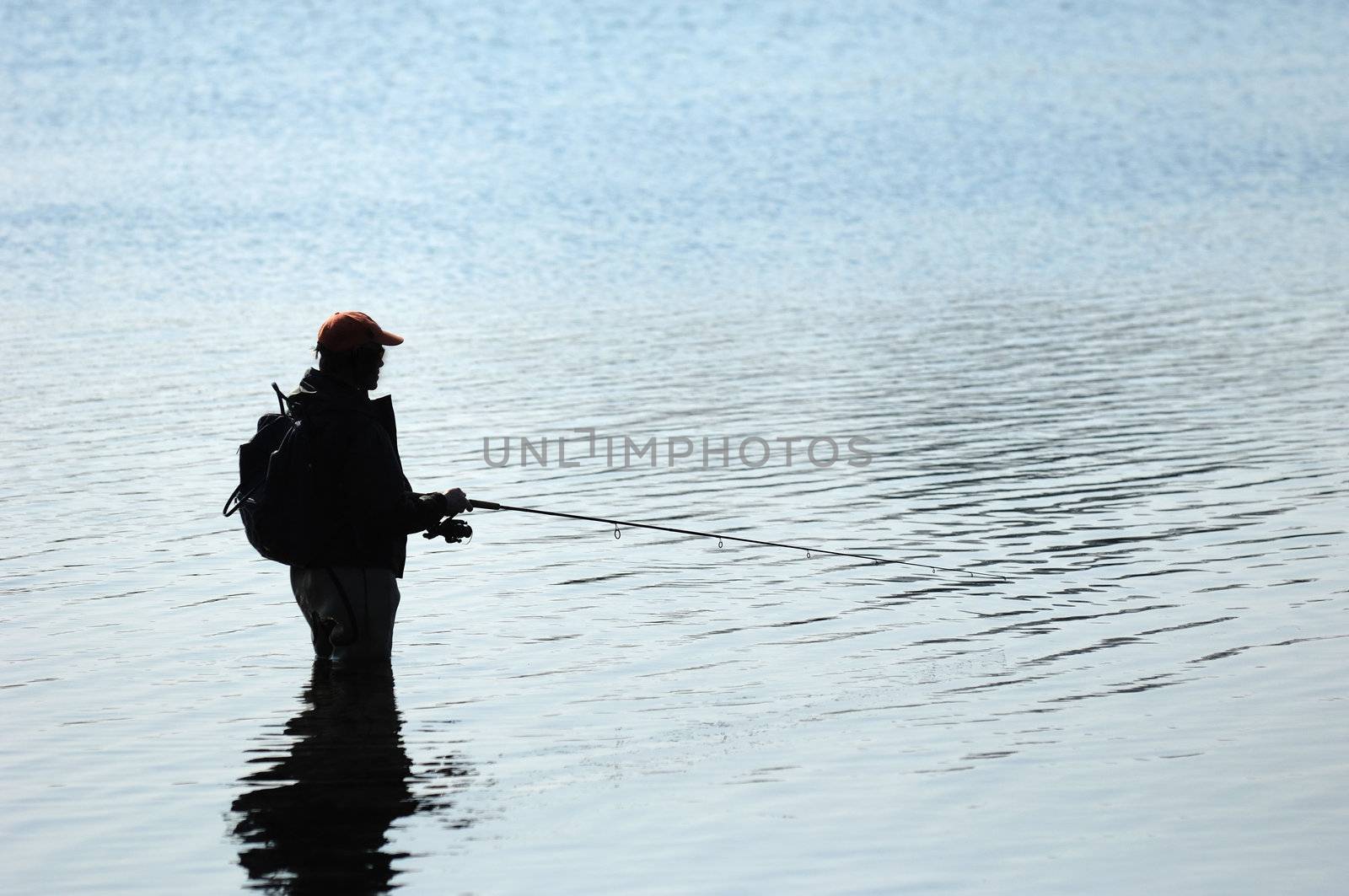 Silhouette of a fisherman 