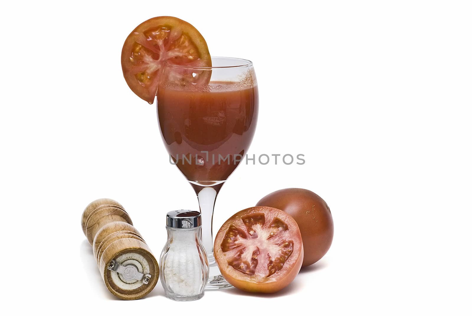 A cup of tomato juice on a white background.