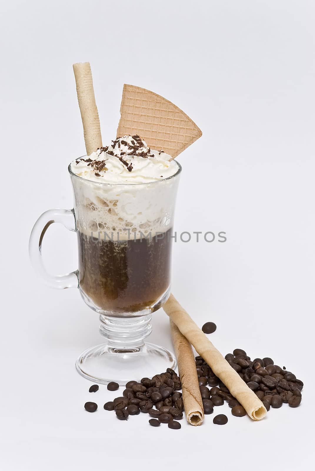 A cup of coffee with whipped cream on a white background.