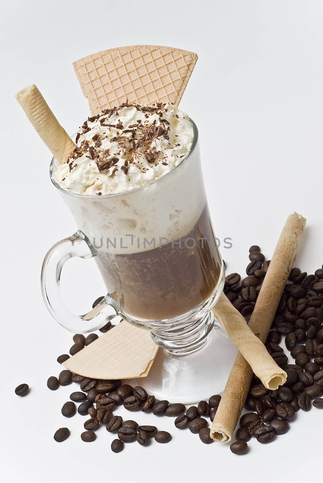 A cup of coffee with whipped cream on a white background.