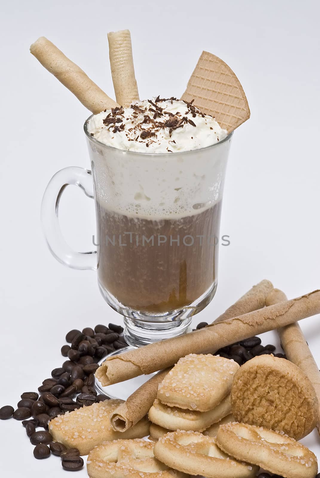 A cup of coffee with whipped cream on a white background.