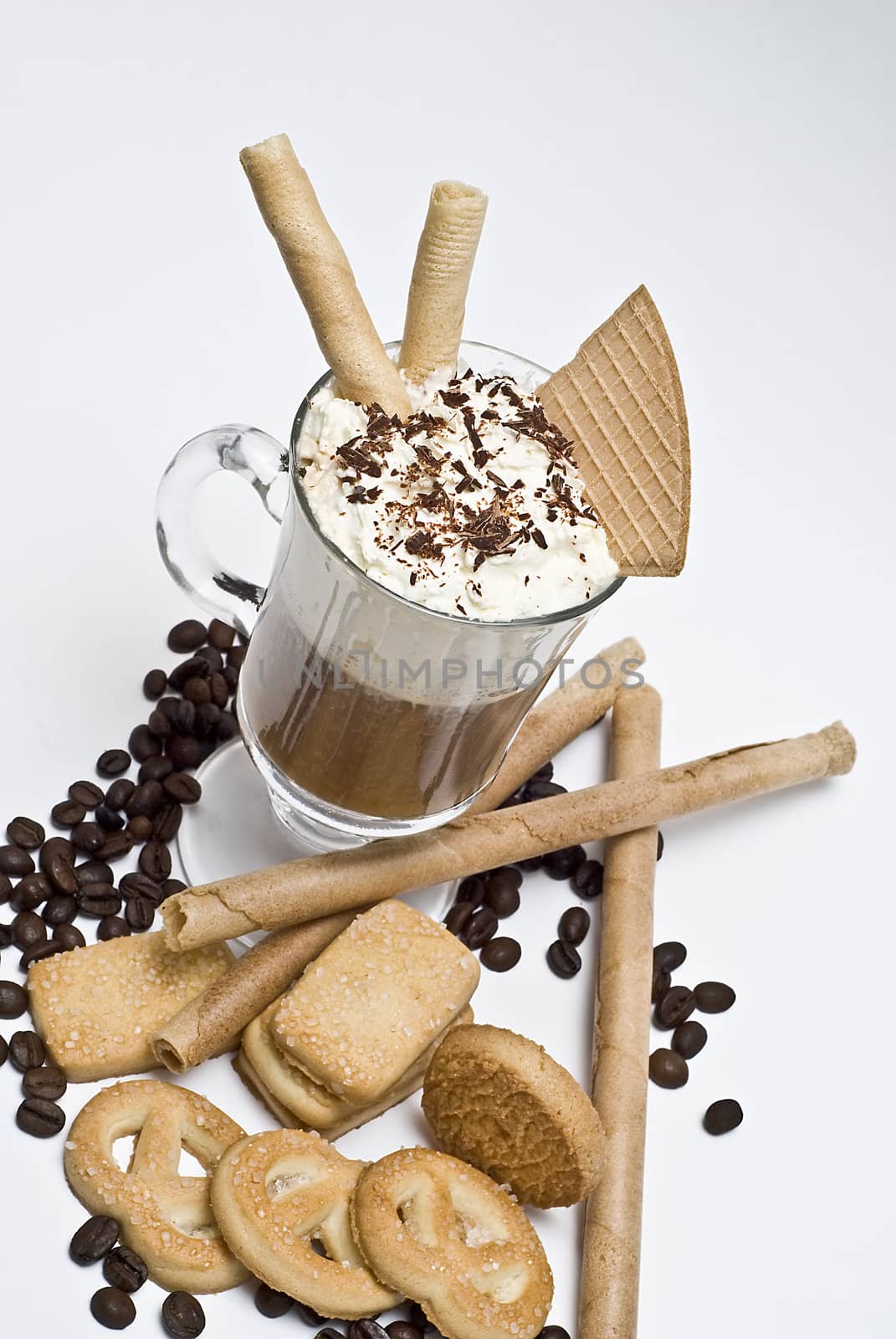 A cup of coffee with whipped cream on a white background.