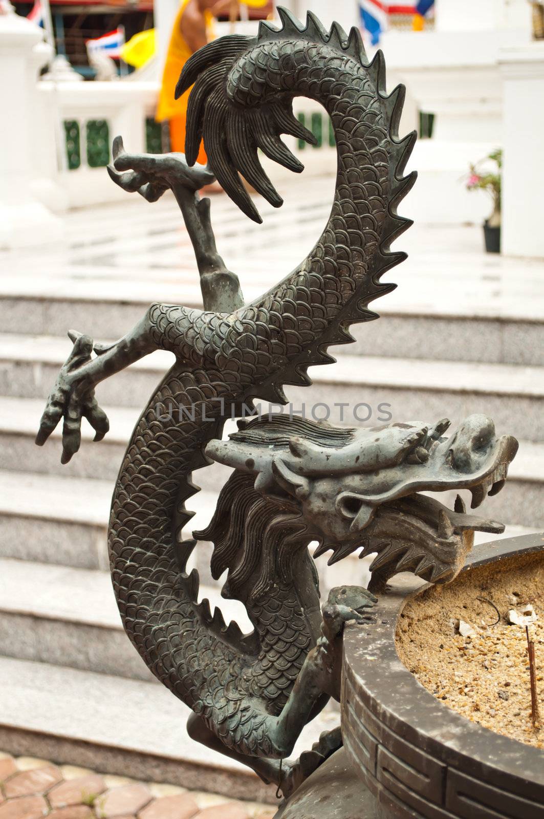 image of dragon on joss stick pot