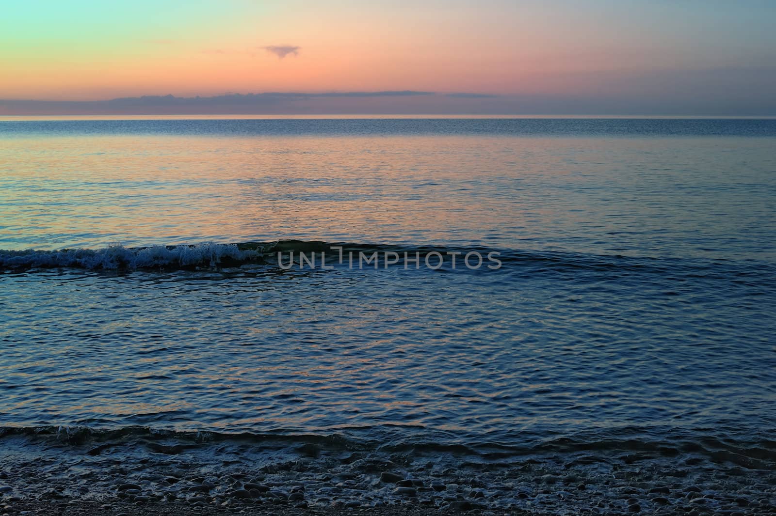 Sea surface with small soft waves in morning