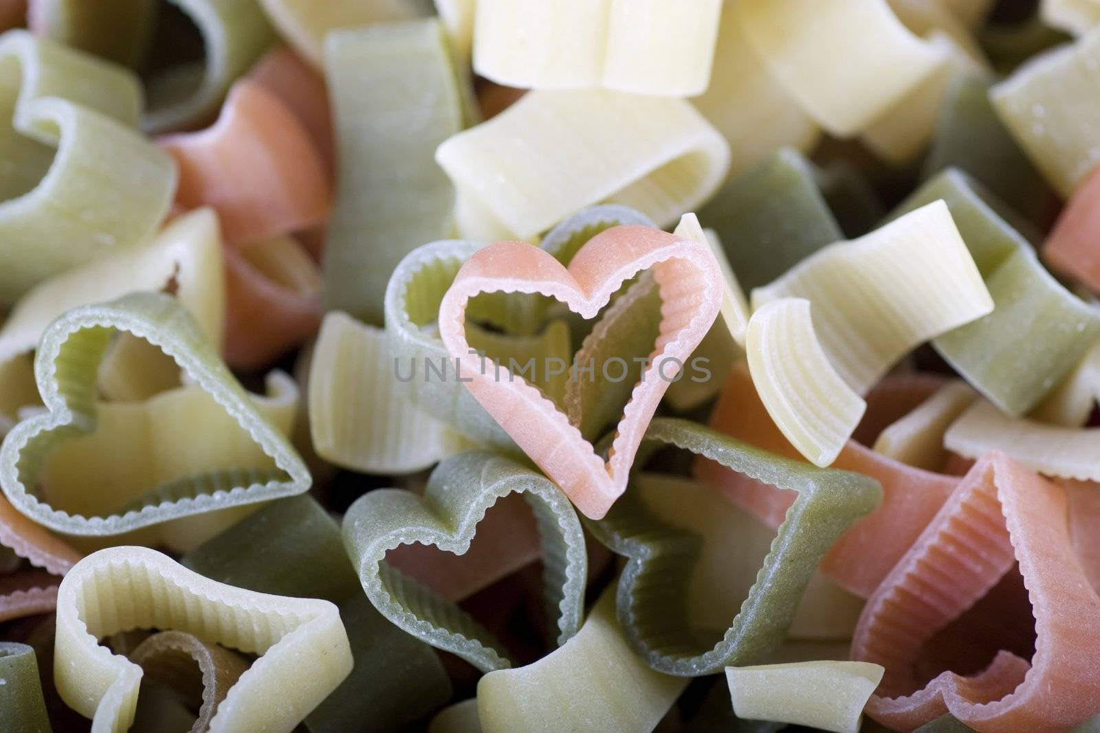 Closeup of multicolored heart shaped pasta