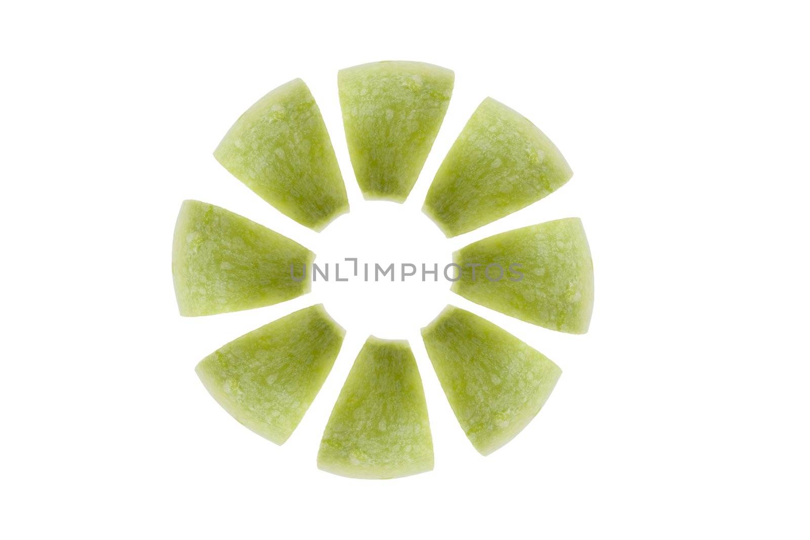 Apple slices in circular shape, view from above.  White background