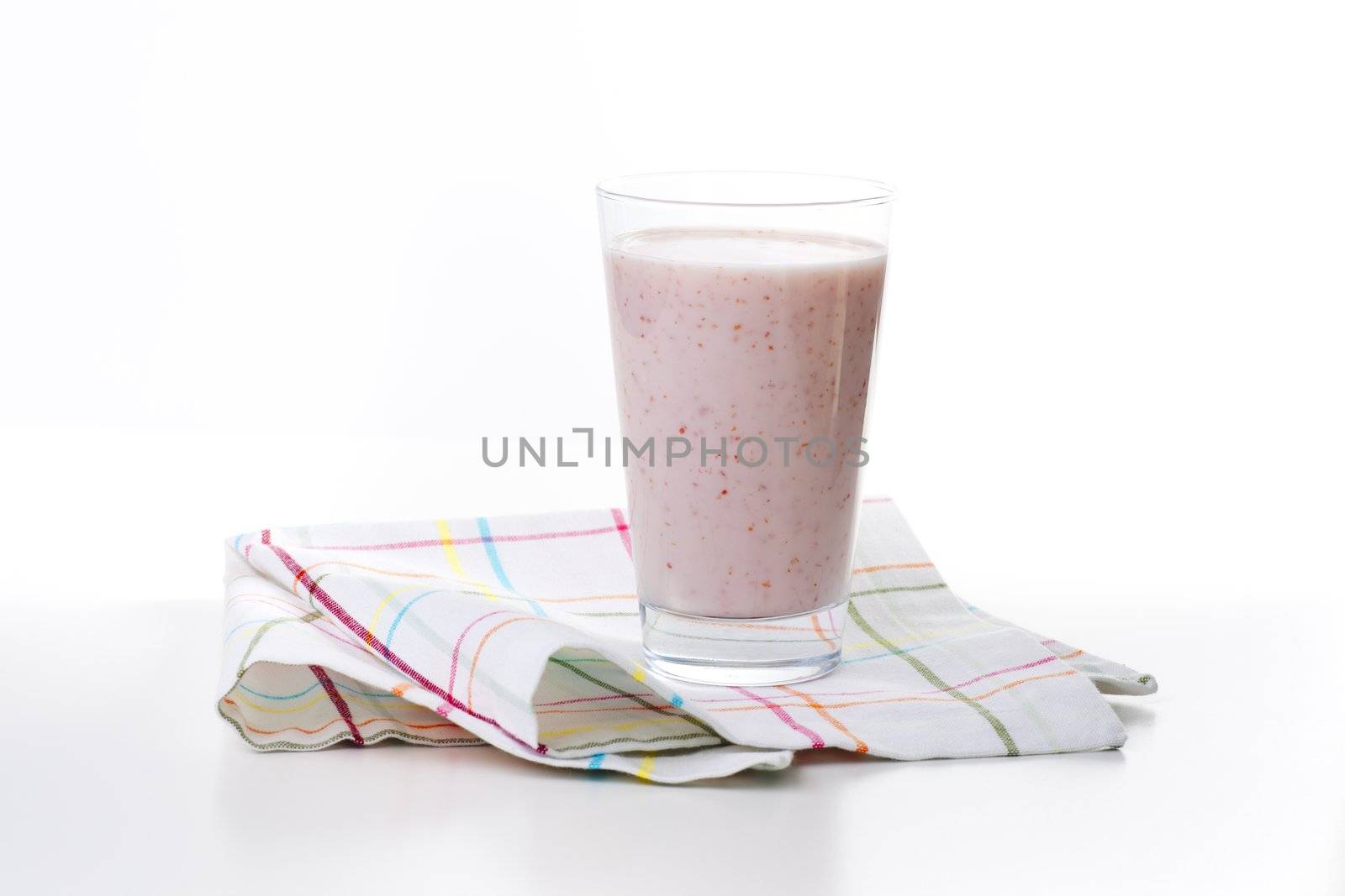 Fresh and healthy strawberry smoothie isolated on a white background