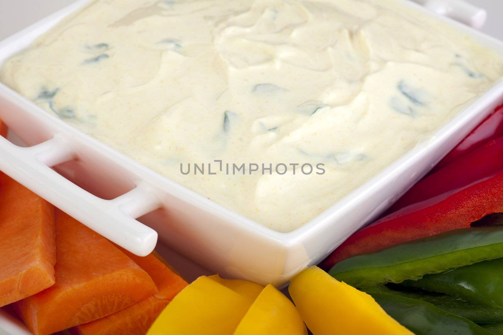 Fresh vegetable sticks and creamy dip appetizer.