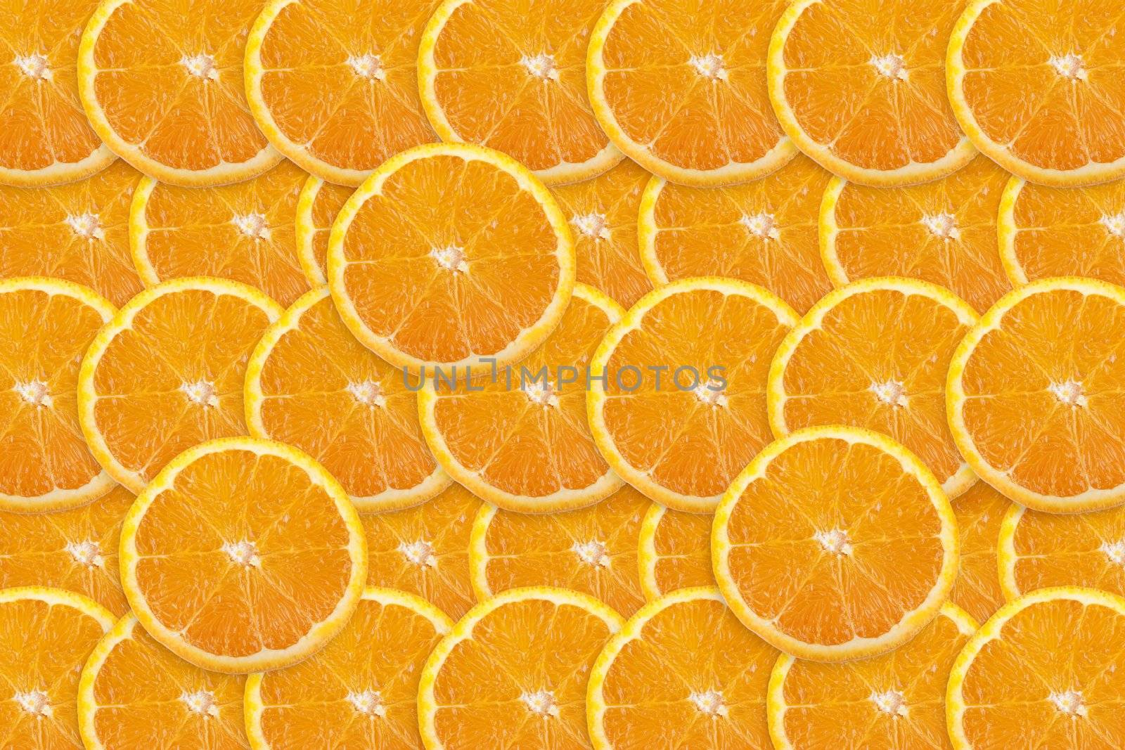 Vibrant orange slices filling entire frame.  Great food background.