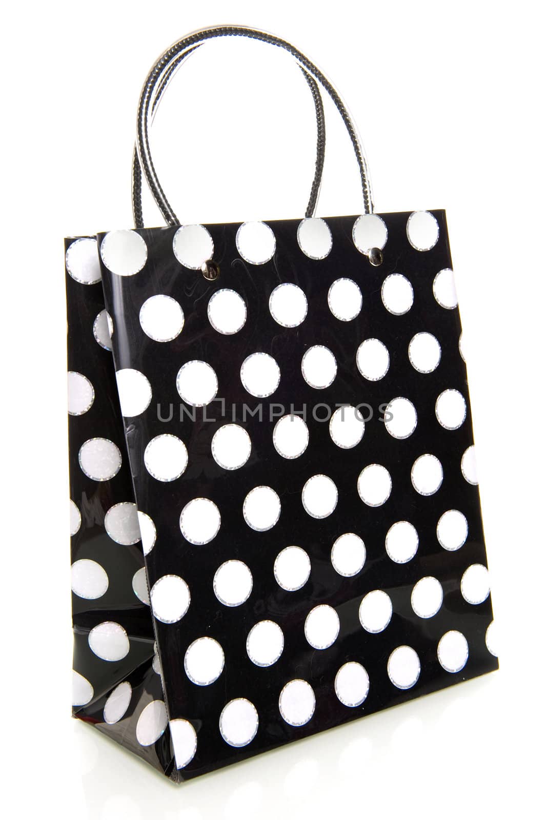 a dotted bag in black and white