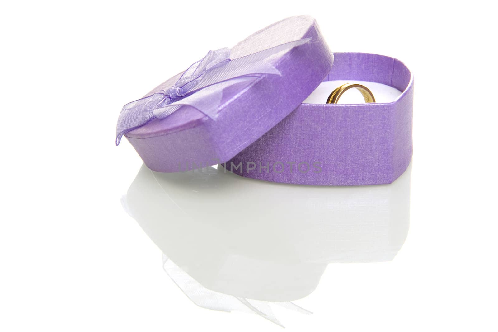 a purple box with a golden ring on a white background