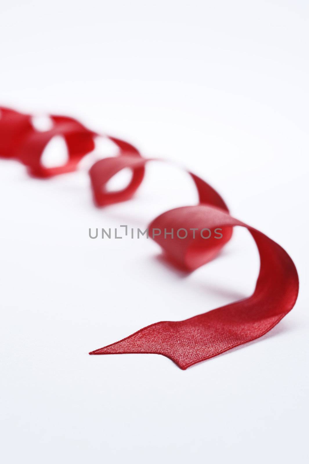 decorative red ribbon isolated on white background