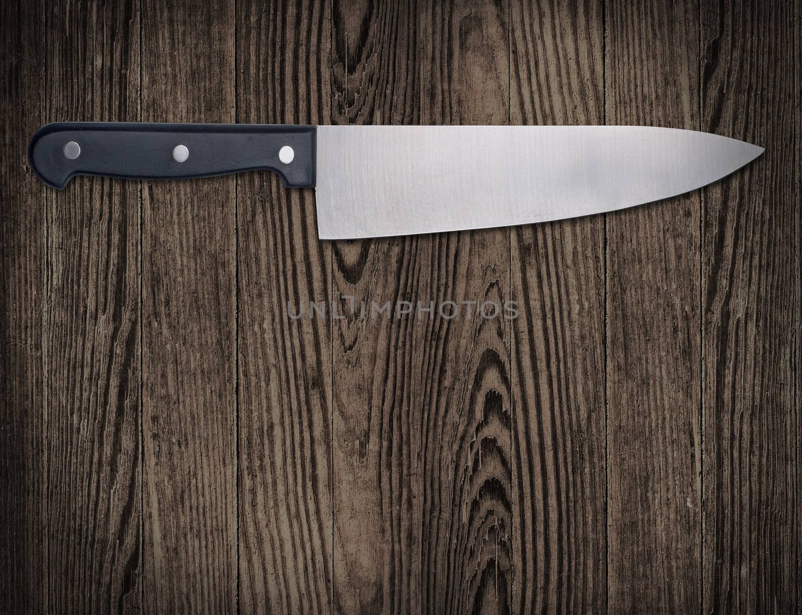 Kitchen knife on wooden table, copy space, clipping path.