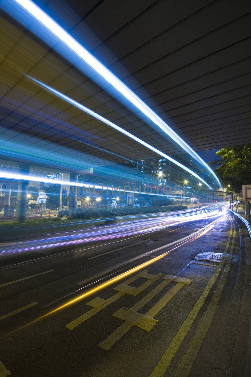 traffic in city at night in hong kong