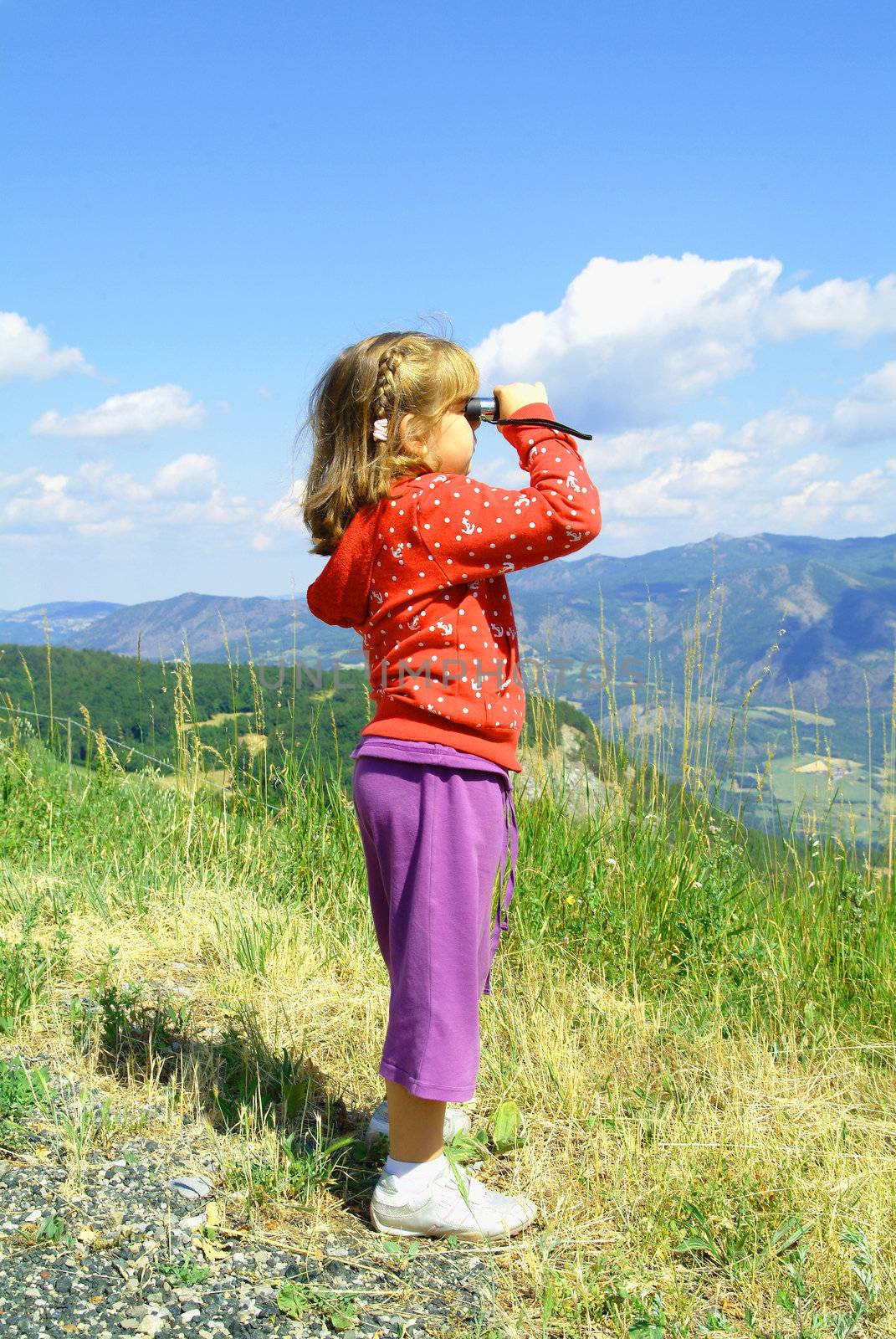 Child looking out the country