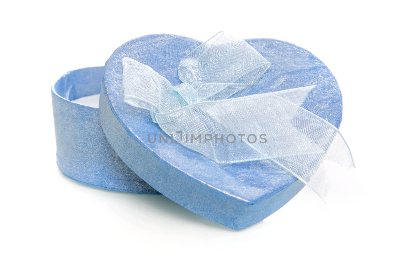 a blue heart box with a bow on a white background