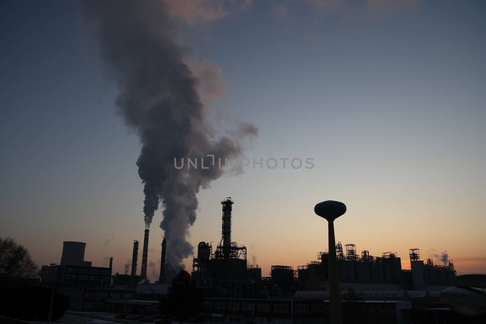 Large petrochemical factory in early night light