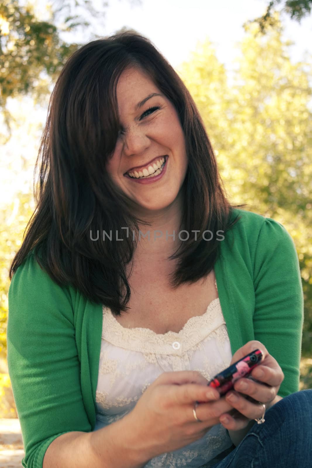 A portrait of a woman in her mid tweenties. 